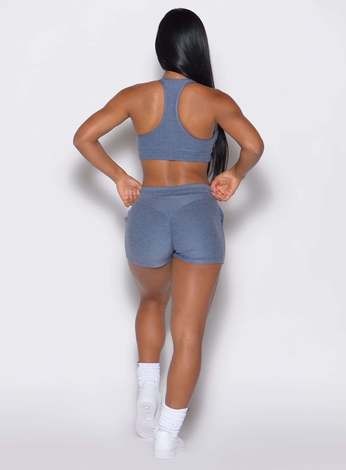 Back profile view of our model wearing our Cloud Lounge Bra in twilight color